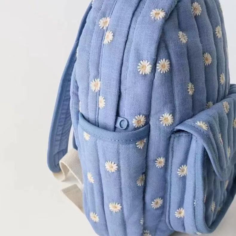 Mochila escolar infantil floral de margaritas